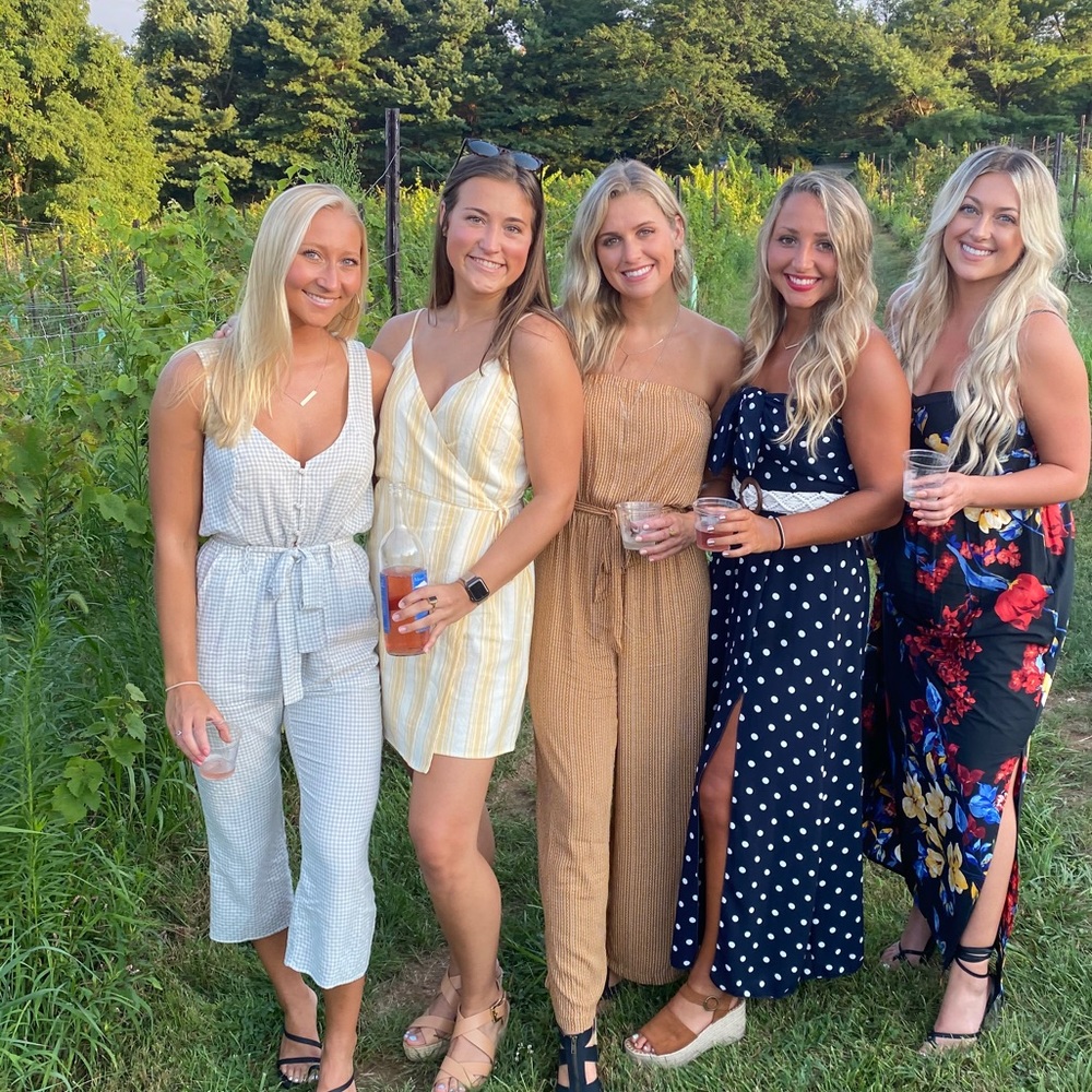 greg jumpsuit on left hand side